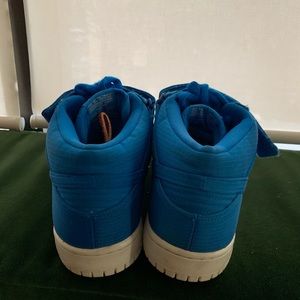 Blue Nike high tops